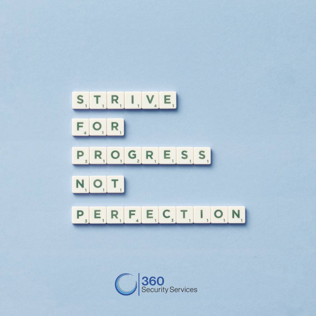 Scrabble tiles laid out to say strive for progress, not perfection
