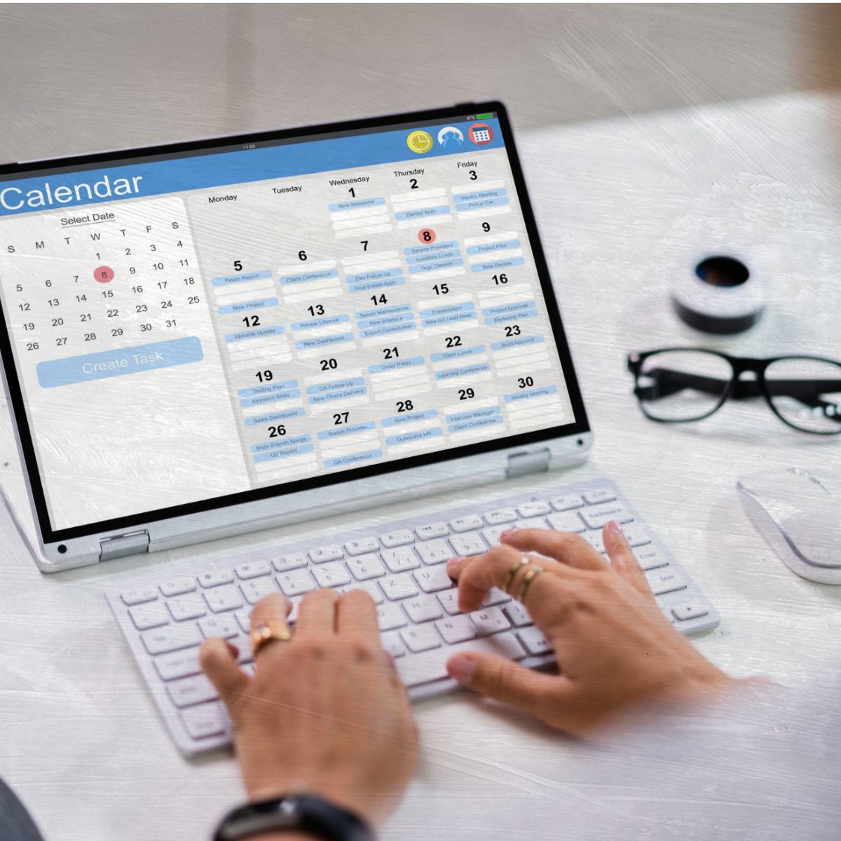 Digital Calendar on a laptop with someone typing